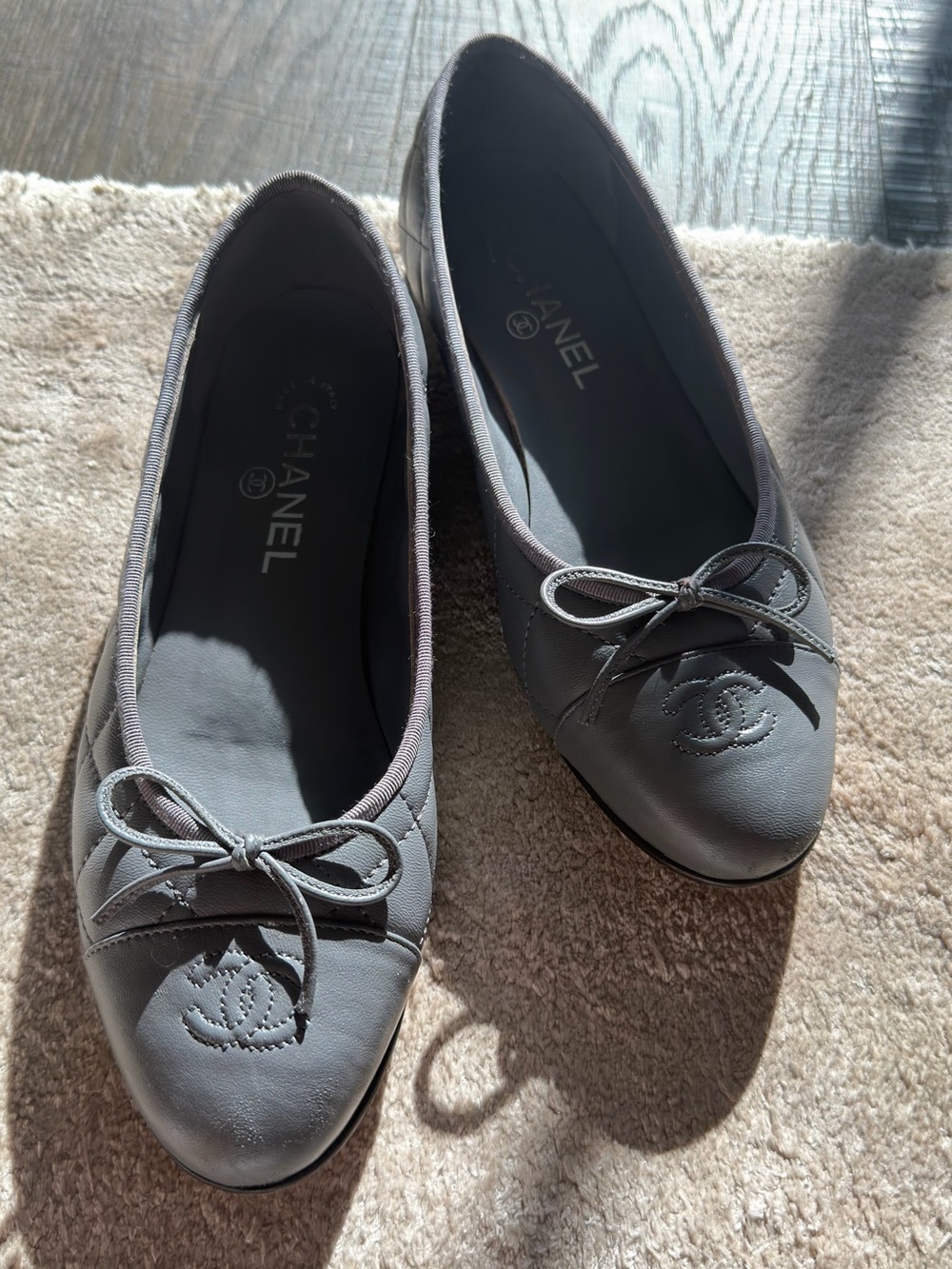 CHANEL Gray Leather Quilted Ballet Flats with CC Emblem and Bow